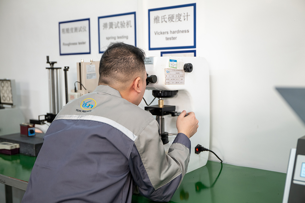 YILIN quality technician performing Vickers hardness testing